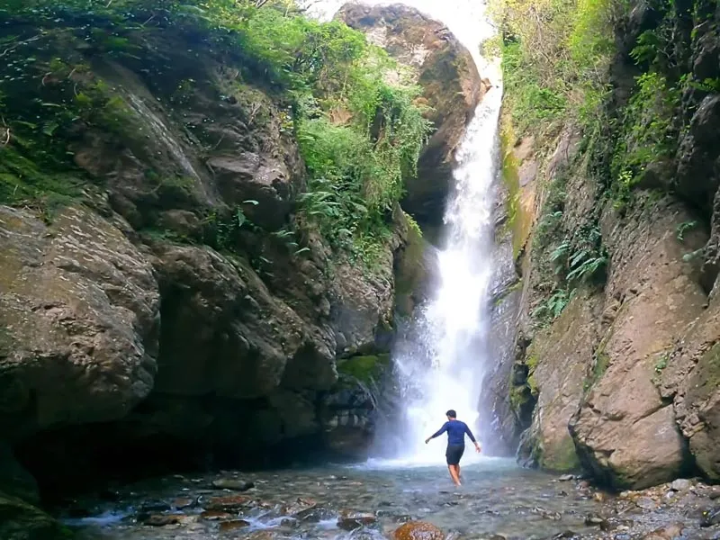 Pristine mountain cascade of Bangoru Waterfall near Bir