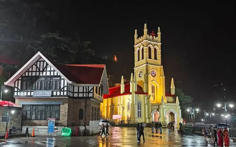 Illuminated Christ Church on The Ridge Shimla glowing against a dark night sky